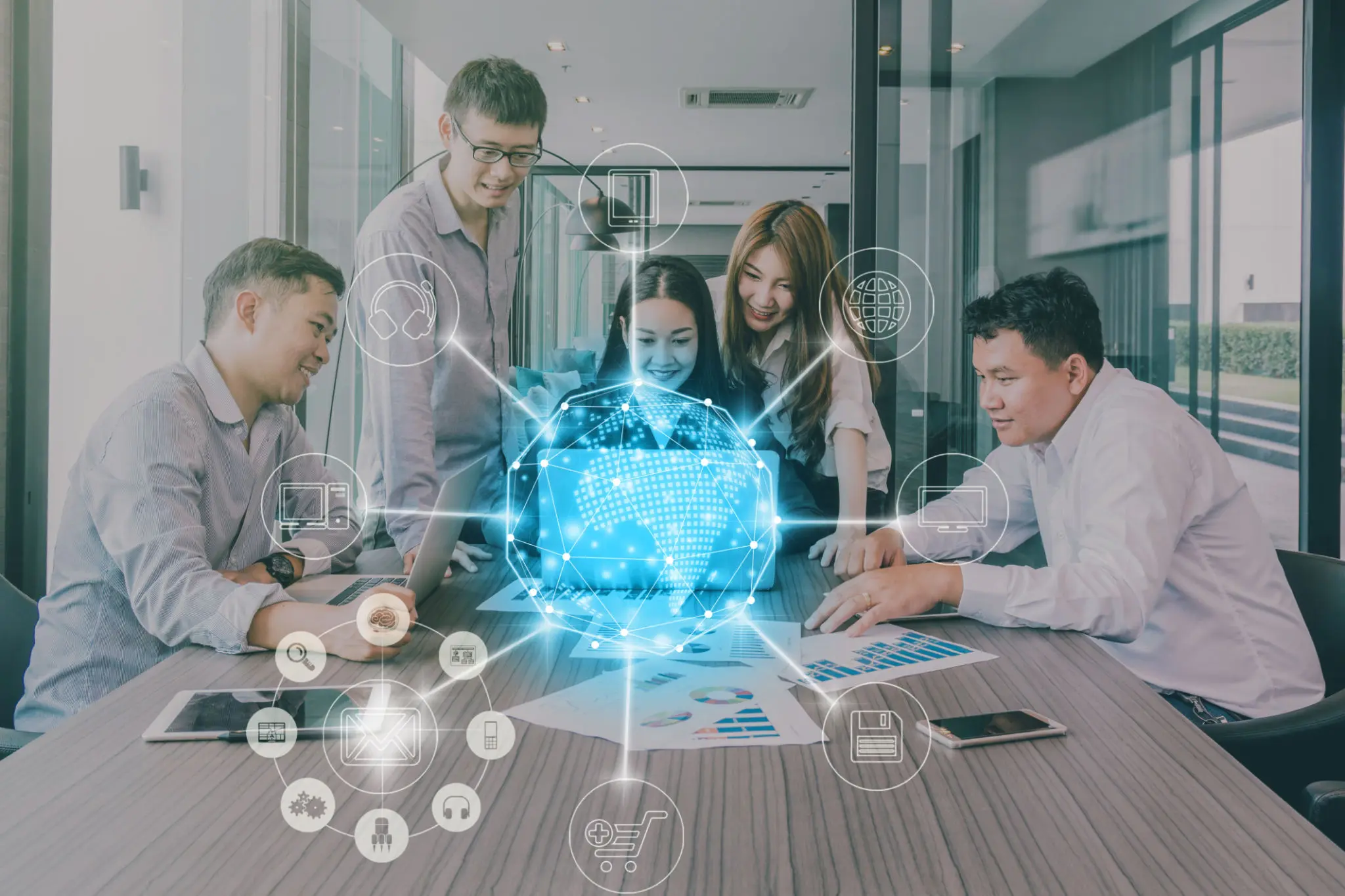 Team collaborating with digital globe hologram.